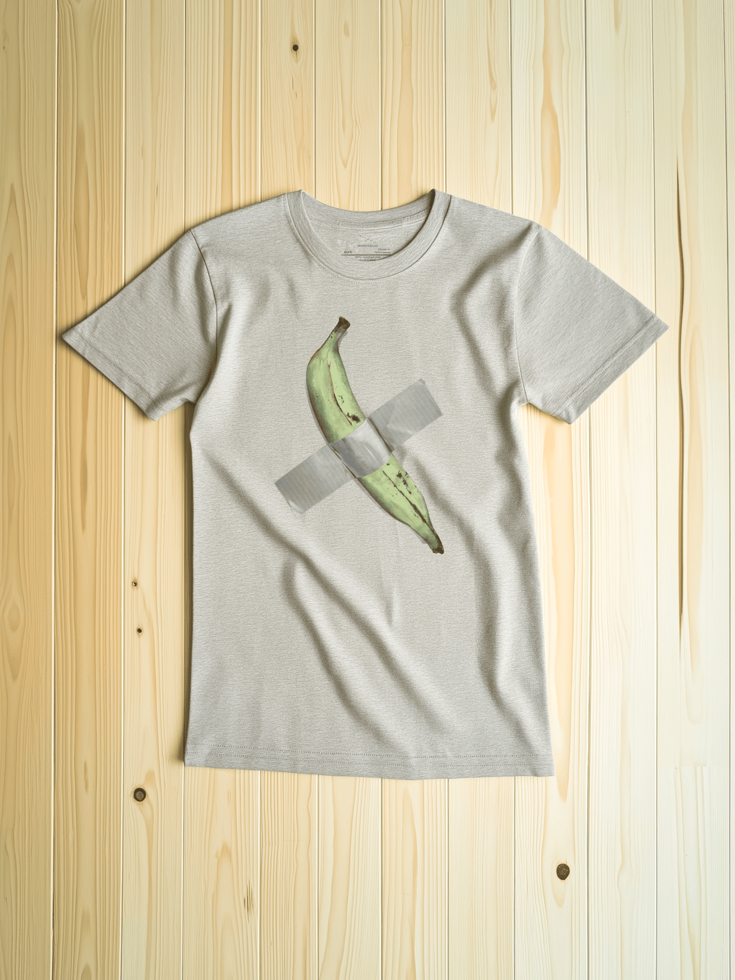 Light beige shirt with a drawing of a plantain duct taped to chest – Wanderluz